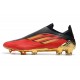 Zapatillas de Fútbol adidas X Speedflow+ FG Rojo Dorado Metálico Negro